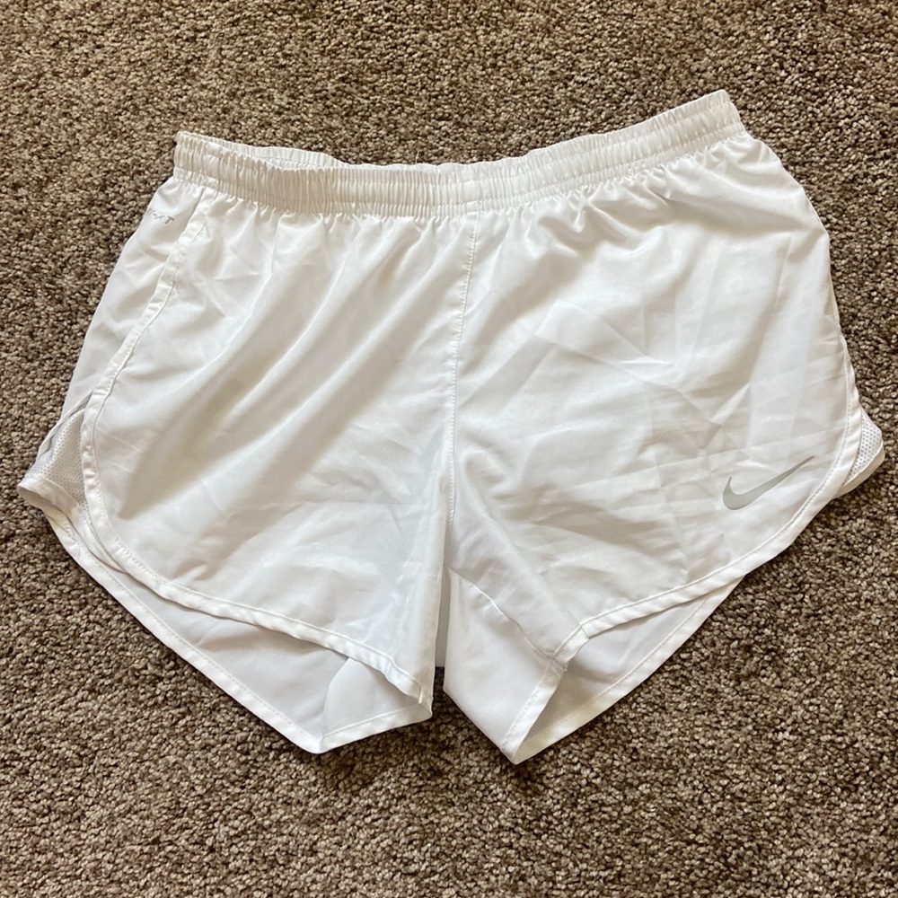 White nike shorts. Built in Underwear. Size Small.